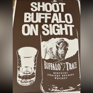 Whiskey tin sign